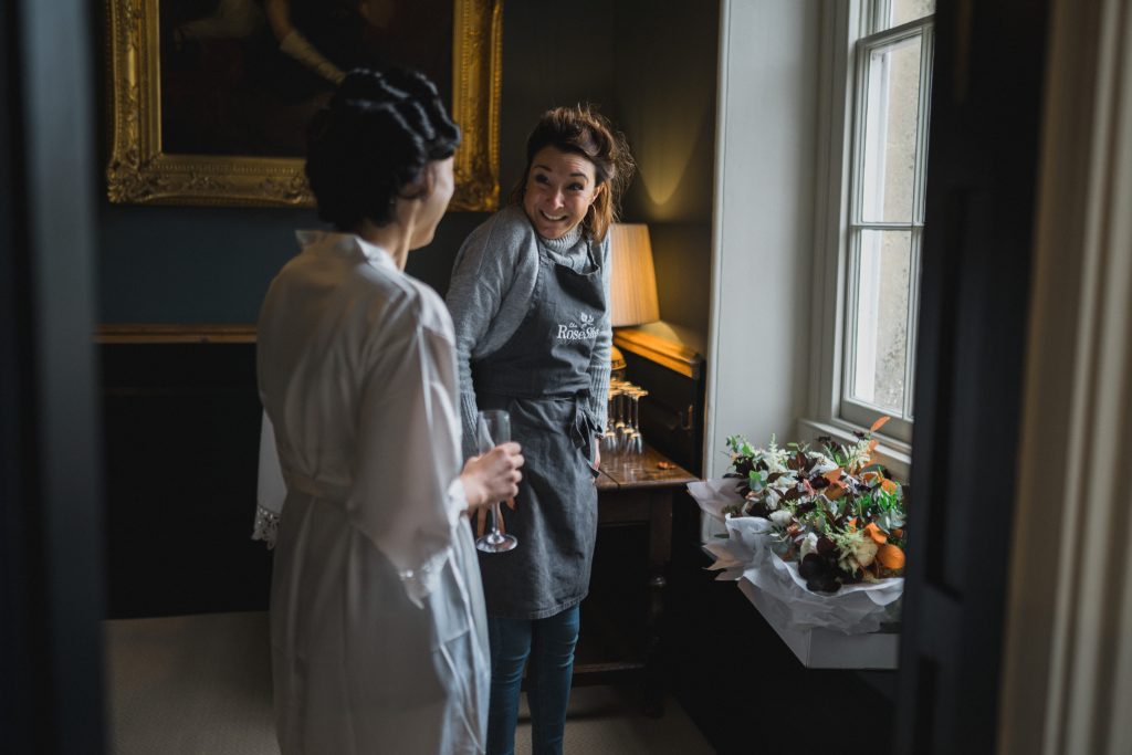 the rose shed delivering flowers Elmore court wedding photographer