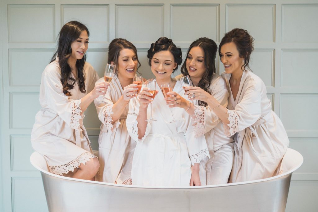 bridal party in bath tub Elmore court wedding photographer