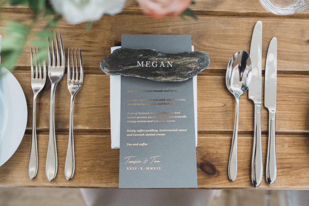 flat lay rock name setting Elmore court wedding