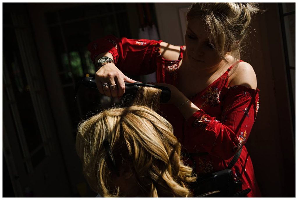lady having hair curled Barnsley house wedding