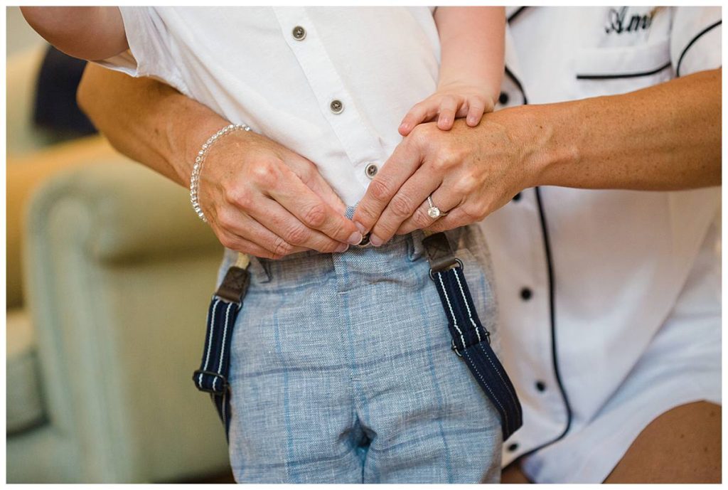boy getting dressed Barnsley house wedding