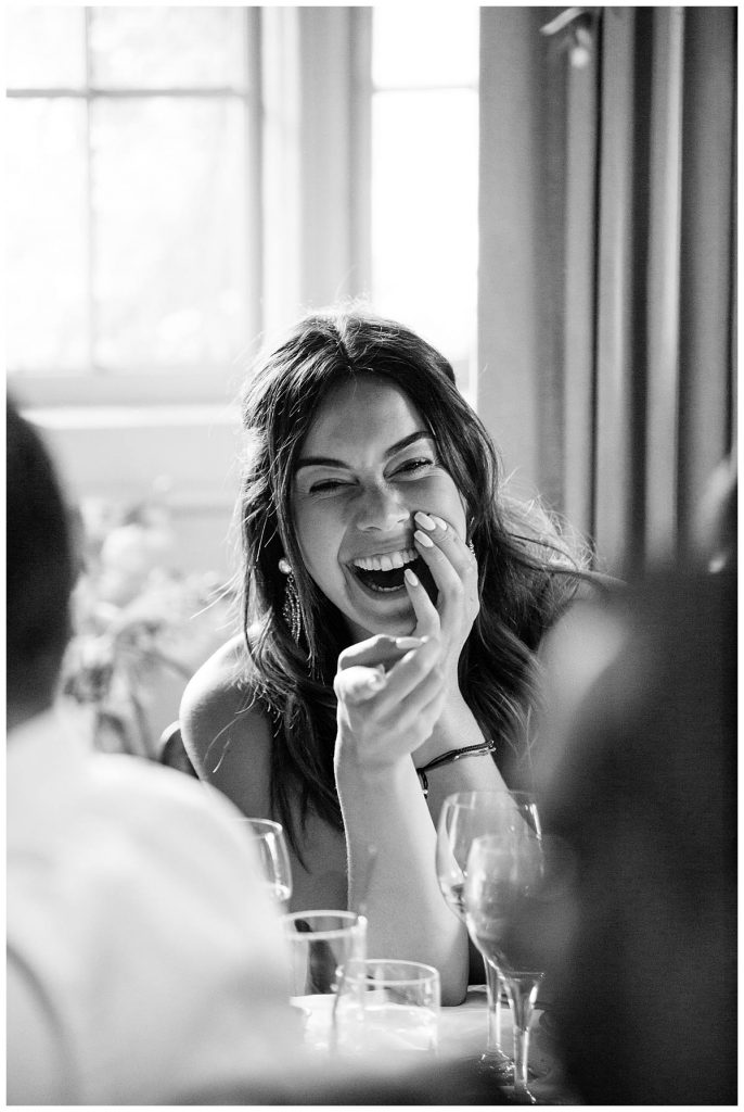 guest laughing Barnsley House wedding gloucestershire wedding photographer
