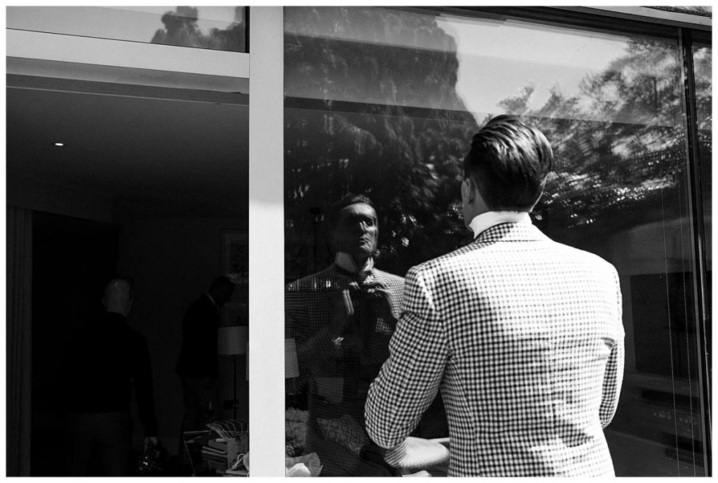 fixing tie Barnsley house wedding photography