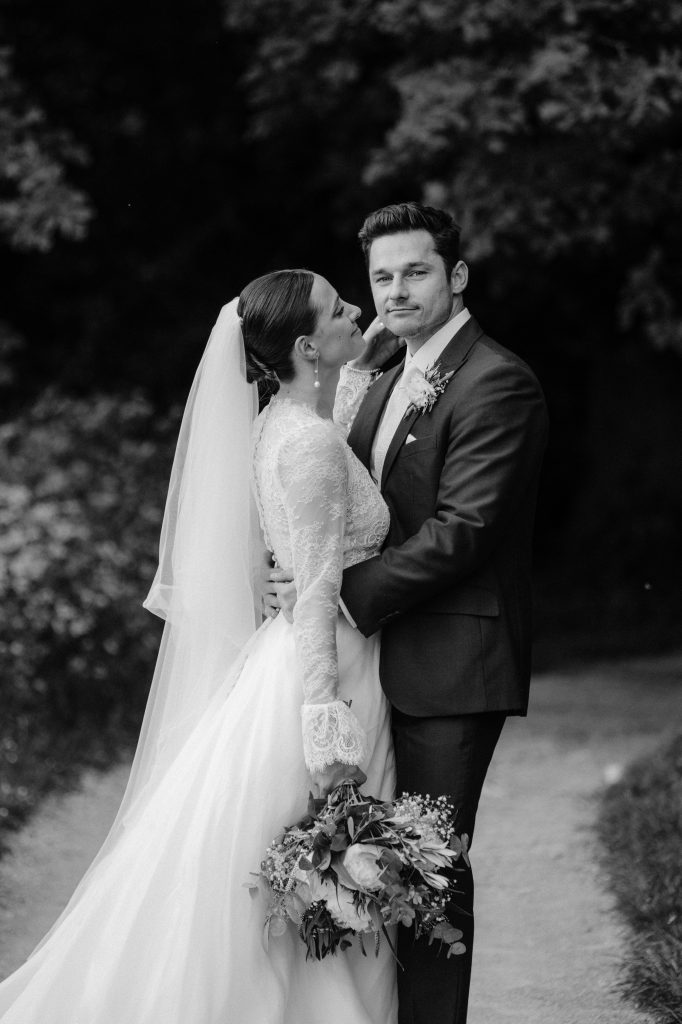 Bride looks at groom during formal wedding, photography, photos, a bath prior Park